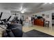 Exercise room with elliptical and other equipment at 20490 Pinewood Dairy Rd, Brooksville, FL 34601