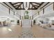 Grand foyer featuring a striking staircase, chandelier and beautiful hardwood floors at 2186 Coffee Pot Ne Blvd, St Petersburg, FL 33704