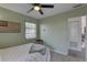 Bright bedroom features natural light, neutral walls, and a comfortable bed at 2311 Wellesley, Bradenton, FL 34207