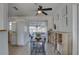 Kitchen and dining area featuring a ceiling fan, tile floors, and access to the screened-in back patio at 2311 Wellesley, Bradenton, FL 34207