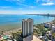 High-rise building with water and city views at 2413 Bayshore Blvd # 1004, Tampa, FL 33629