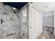 Shower with marble tile and glass enclosure at 2413 Bayshore Blvd # 1004, Tampa, FL 33629