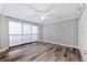 Well-lit bedroom featuring wood-look flooring and large windows at 2413 Bayshore Blvd # 1004, Tampa, FL 33629