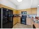 Well-equipped community kitchen with modern appliances at 2413 Bayshore Blvd # 1004, Tampa, FL 33629