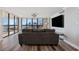 Living room with hardwood floors and city views at 2413 Bayshore Blvd # 1004, Tampa, FL 33629