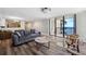 Living room with water views and seating area at 2413 Bayshore Blvd # 1004, Tampa, FL 33629