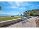 Community patio with chairs overlooking the bay at 2413 Bayshore Blvd # 1004, Tampa, FL 33629