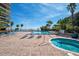 Relaxing pool and hot tub area with ample lounge chairs at 2413 Bayshore Blvd # 1004, Tampa, FL 33629