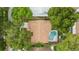 Property features a pool and lush landscaping at 2717 Briarpatch Dr, Valrico, FL 33596