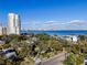 Aerial shot of a neighborhood with mature trees showcasing the building's close proximity to the bay at 2907 W Euclid Ave, Tampa, FL 33629