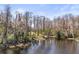 Wooded lakeside property with a tranquil waterfront at 3663 Berger Rd, Lutz, FL 33548