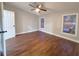 Spacious bedroom with hardwood floors and ceiling fan at 3749 Loury Dr, Wesley Chapel, FL 33543