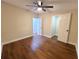 Spacious bedroom with ceiling fan and wood-look flooring at 3749 Loury Dr, Wesley Chapel, FL 33543