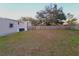 Side view of mobile home showing large backyard at 3749 Loury Dr, Wesley Chapel, FL 33543