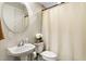 Clean bathroom with a shower/tub combo and white vanity at 3814 W Sevilla St, Tampa, FL 33629