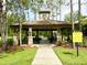 Covered picnic pavilion with tables and benches at 4110 Huntingdale Ct, Wesley Chapel, FL 33543