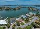 Aerial view showcasing home's waterfront location at 476 Harbor S Dr, Indian Rocks Beach, FL 33785