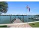 Private wooden dock offering direct water access at 476 Harbor S Dr, Indian Rocks Beach, FL 33785