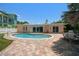 Relaxing kidney shaped pool and patio area at 476 Harbor S Dr, Indian Rocks Beach, FL 33785