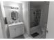 Bathroom with white vanity, bathtub, and shower at 5108 Redwood Ter, North Port, FL 34286