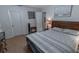 Bright bedroom with a double bed, and wood flooring at 5108 Redwood Ter, North Port, FL 34286