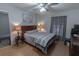 Bedroom with a double bed, nightstands, and wood flooring at 5108 Redwood Ter, North Port, FL 34286