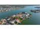 Aerial view of a waterfront property in a beautiful neighborhood with scenic water views at 521 Harbor N Dr, Indian Rocks Beach, FL 33785