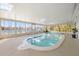 Indoor pool features a unique design and lots of windows for natural light at 521 Harbor N Dr, Indian Rocks Beach, FL 33785