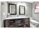 Bathroom with double vanity, marble countertop, and modern fixtures at 5232 White Sand Ne Cir, St Petersburg, FL 33703