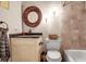 Charming bathroom with updated vanity, stone countertop, and tiled shower/tub at 5232 White Sand Ne Cir, St Petersburg, FL 33703