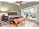 Main bedroom with sliding glass doors to a private patio at 5232 White Sand Ne Cir, St Petersburg, FL 33703