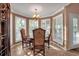 Charming breakfast nook with a round table and chairs, featuring abundant natural light at 5232 White Sand Ne Cir, St Petersburg, FL 33703