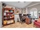 Home office with built-in shelving, comfortable seating, and plenty of natural light at 5232 White Sand Ne Cir, St Petersburg, FL 33703