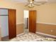 Bedroom with a view of a closet and a doorway to another room at 5353 Shaw St, New Port Richey, FL 34652