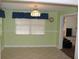 Dining room with tiled flooring and a view into an adjacent room at 5353 Shaw St, New Port Richey, FL 34652