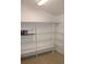 This walk-in pantry features ample shelving for plenty of storage at 5353 Shaw St, New Port Richey, FL 34652