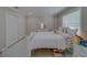 Spacious bedroom with white built-in closet and a plush bed at 659 Keene Rd, Largo, FL 33771