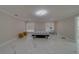 Bright bedroom featuring marble floors and a comfortable bed at 659 Keene Rd, Largo, FL 33771