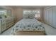 Charming bedroom with a twin-size bed and coastal bedding at 659 Keene Rd, Largo, FL 33771