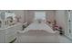 Charming bedroom with white furniture and decorative accents at 659 Keene Rd, Largo, FL 33771