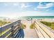 Wooden boardwalk leads to a beautiful, sandy beach at 664 60Th S St, St Petersburg, FL 33707