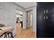 Hallway with view into dining area and kitchen at 664 60Th S St, St Petersburg, FL 33707