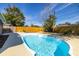 Inviting blue swimming pool in backyard at 664 60Th S St, St Petersburg, FL 33707