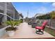 Wooden patio deck showcasing outdoor seating and a view of backyard space at 6702 Harbor Dr, Hudson, FL 34667