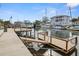 Private dock on a canal featuring multiple boat slips and deep sailboat water access at 6702 Harbor Dr, Hudson, FL 34667