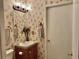 Small bathroom with vanity, toilet and mirror at 8326 Fantasia Park Way, Riverview, FL 33578