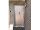 Apartment door with keyless entry and a doormat at 9011 Westchester Cir # 24, Tampa, FL 33604