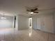 Open living area with tile floors and neutral walls at 9011 Westchester Cir # 24, Tampa, FL 33604