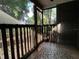 Private screened patio with backyard view at 9011 Westchester Cir # 24, Tampa, FL 33604