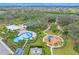 Aerial view of community amenities including pools and playground at 10023 Eventide Trl, Parrish, FL 34219